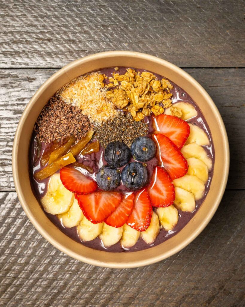 fruit bowl with bananas, strawberries and blueberries and oats from Winston's CUP Cafe